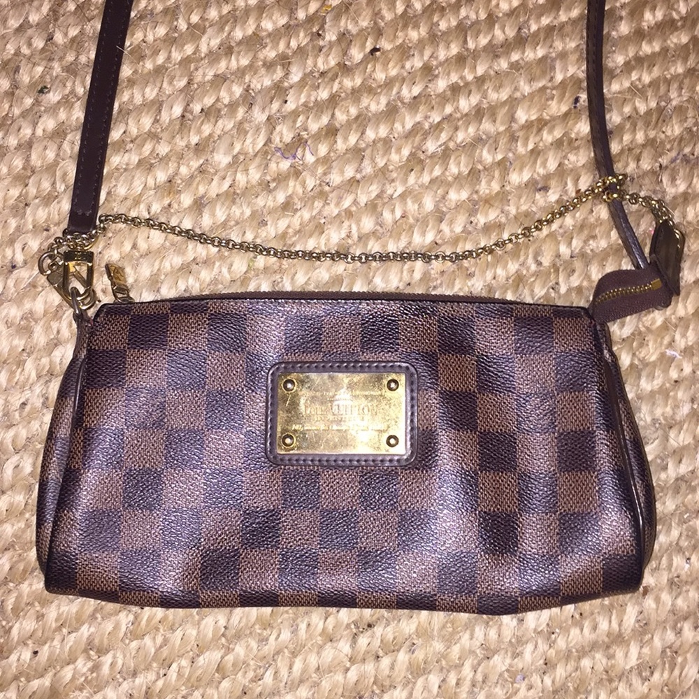 Louis Vuitton clutch or crossbody bag optional